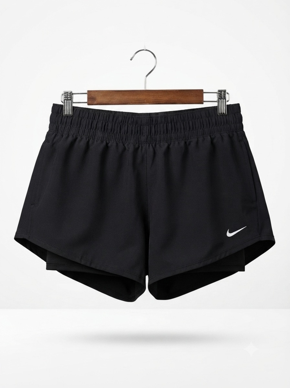 Nike Women's Black Athletic Running Shorts with Silver Swoosh